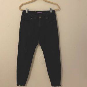 Black mid ripped jeans.